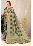 Scintilla Green Soft Banarasi Silk Saree With Palimpsest Blouse Piece